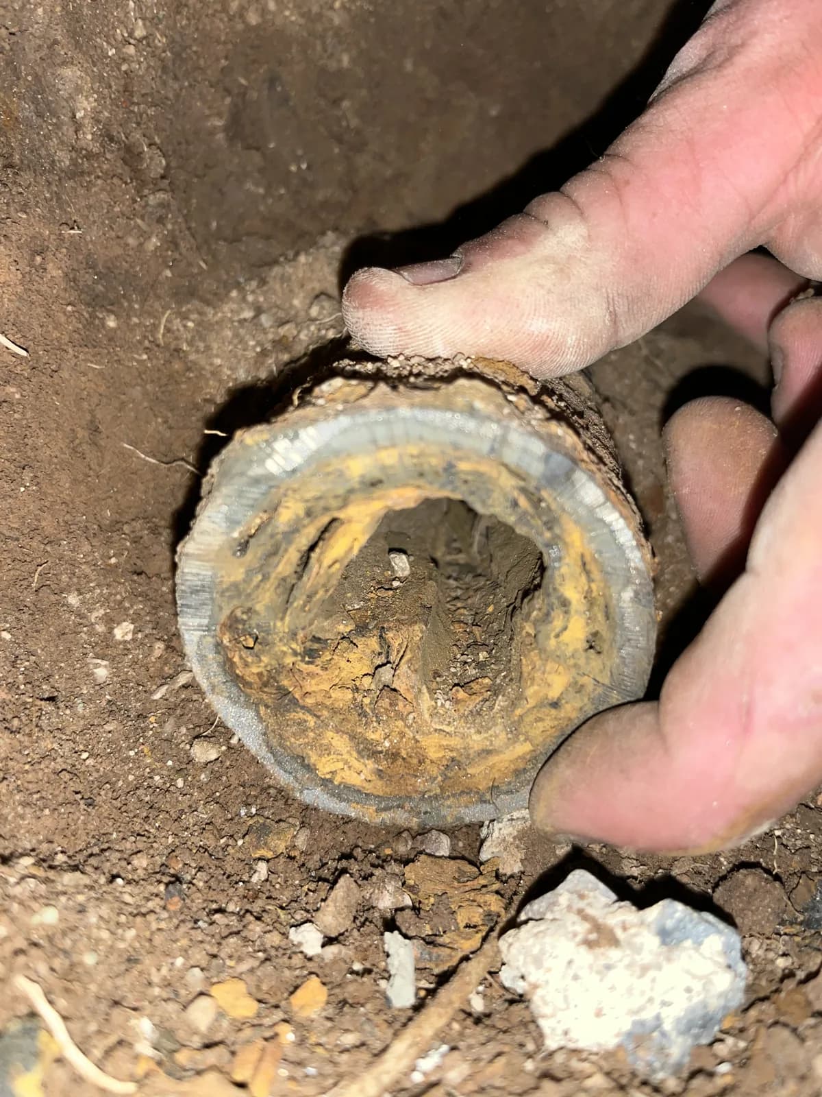 Severely corroded galvanised water line removed from a Tucson home